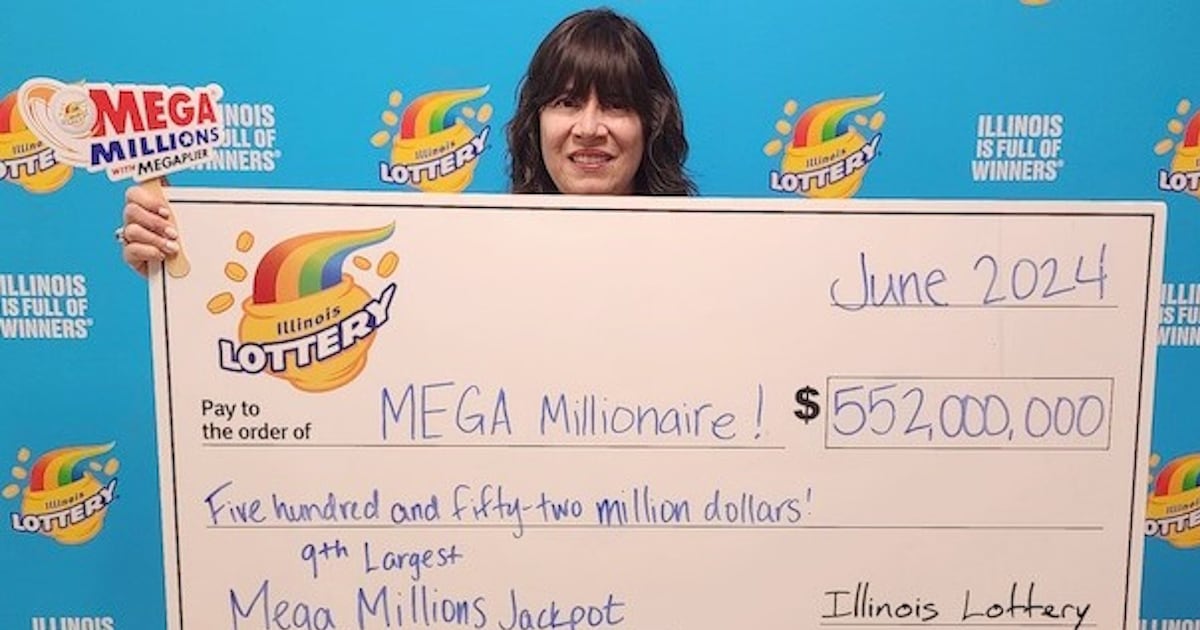 Derek Thompson with winning check